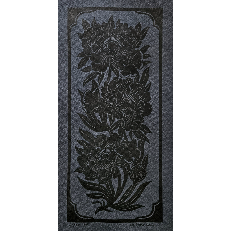 Relief print with black flowers and butterflies on slate color cotton rag paper