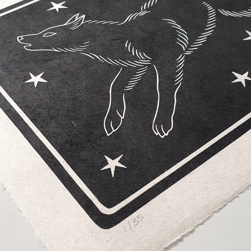 Detail of a wolf linocut block print