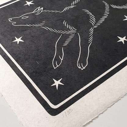 Detail of a wolf linocut block print