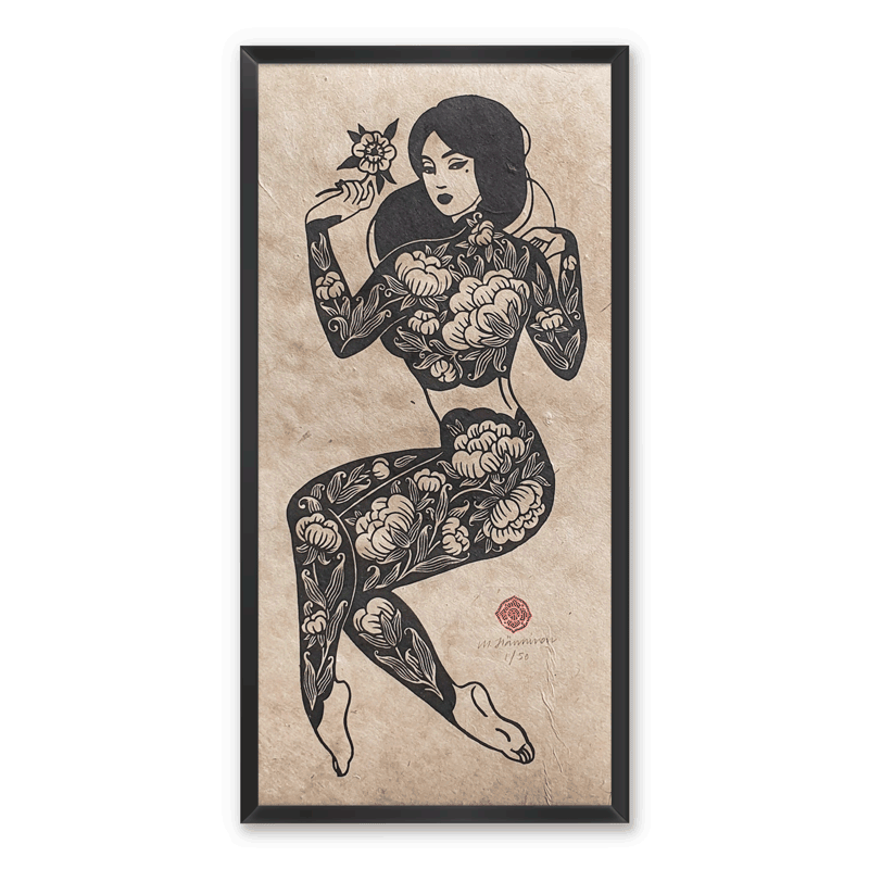 A linocut print of a woman with peony tattoos holding a flower