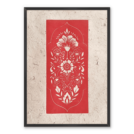 A framed linocut print of a red folk art inspired floral pattern