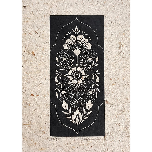 Linocut print of a folksy floral pattern in black
