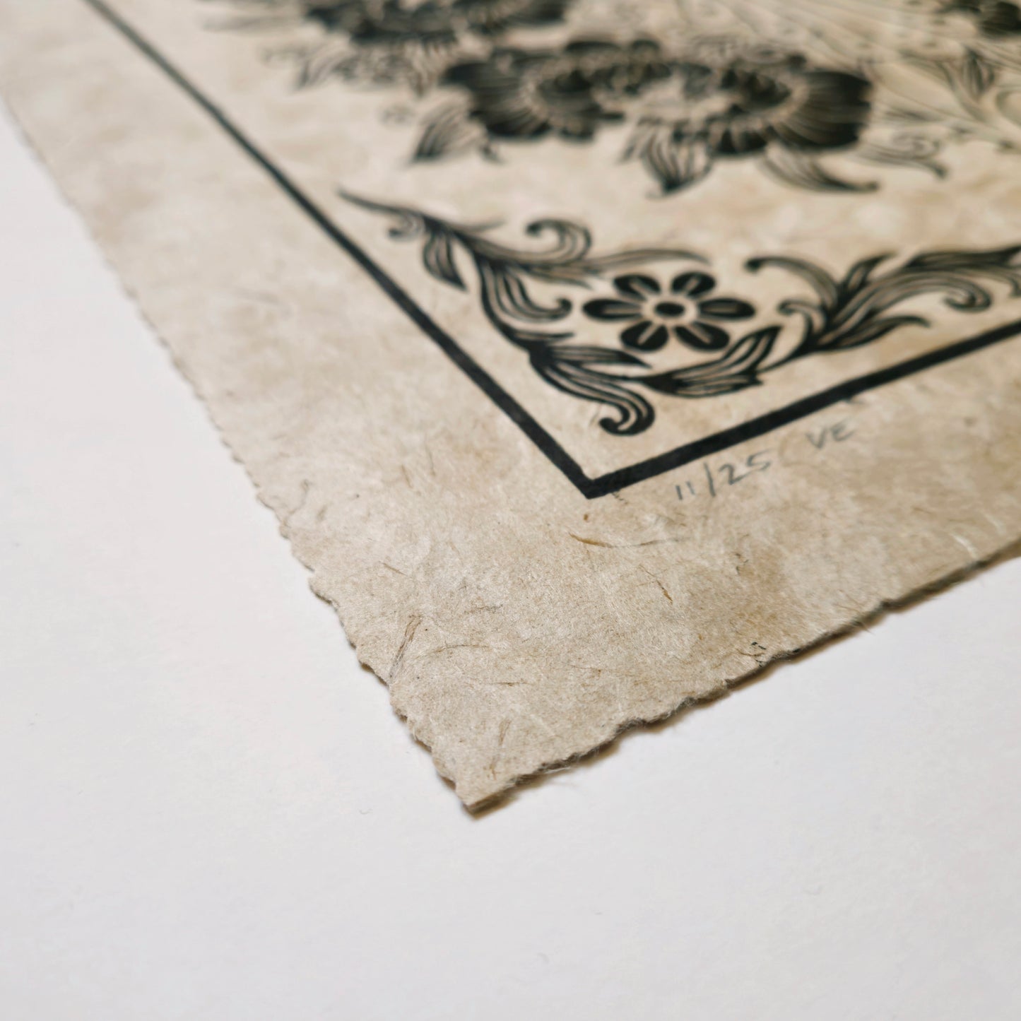 Detail of a linocut print deckle edge