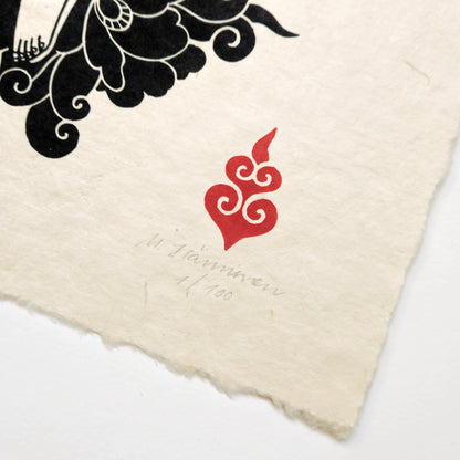 Linocut stamp on handmade paper 