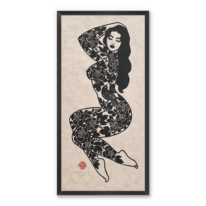 Framed linocut print of a woman with rose and bird tattoos