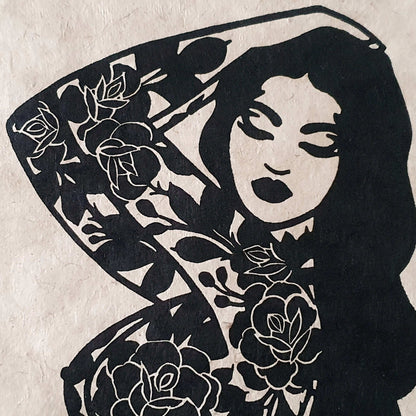 Detail of a tattooed lady linocut print