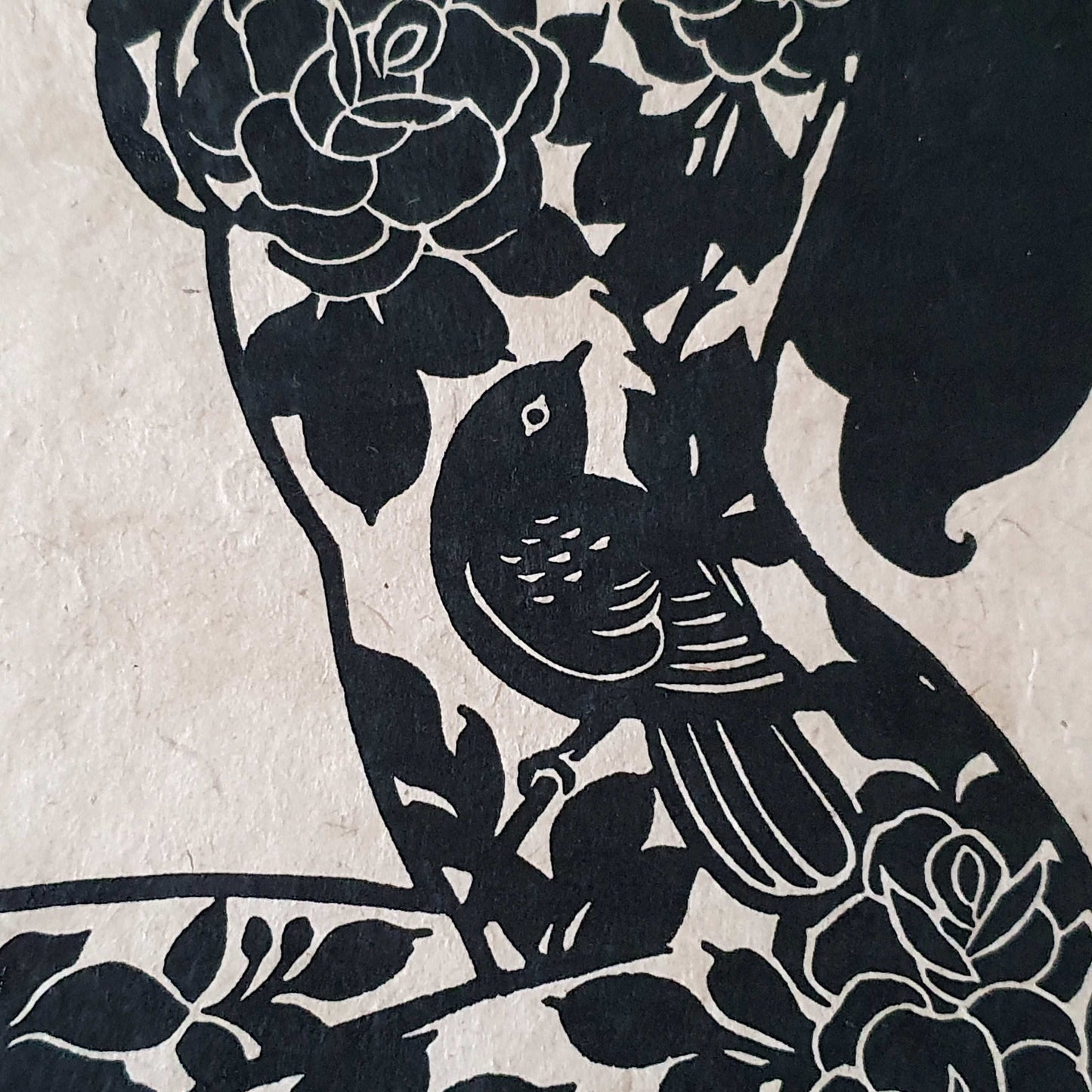 Bird detail on a tattooed lady linocut print