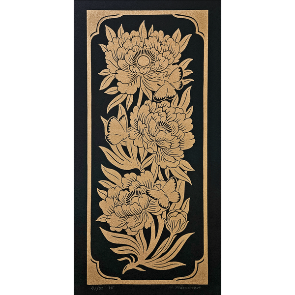 Linocut print with golden flowers and butterflies on black paper