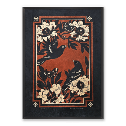 A framed linocut print featuring a folk-art style design with two black birds, gold flowers, and butterflies on a textured red background, enclosed in a dark charcoal frame.