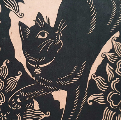 Detail of a black cat linocut print