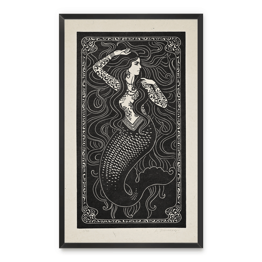 Framed artwork of a mermaid with intricate patterns on a white background