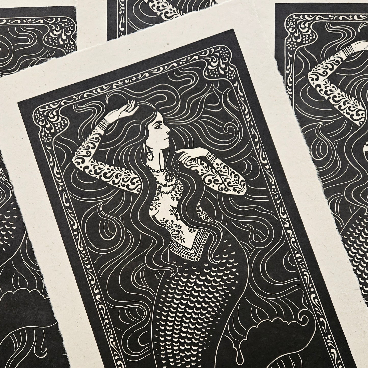 Black and white illustration of a woman with flowing hair on a textured paper background